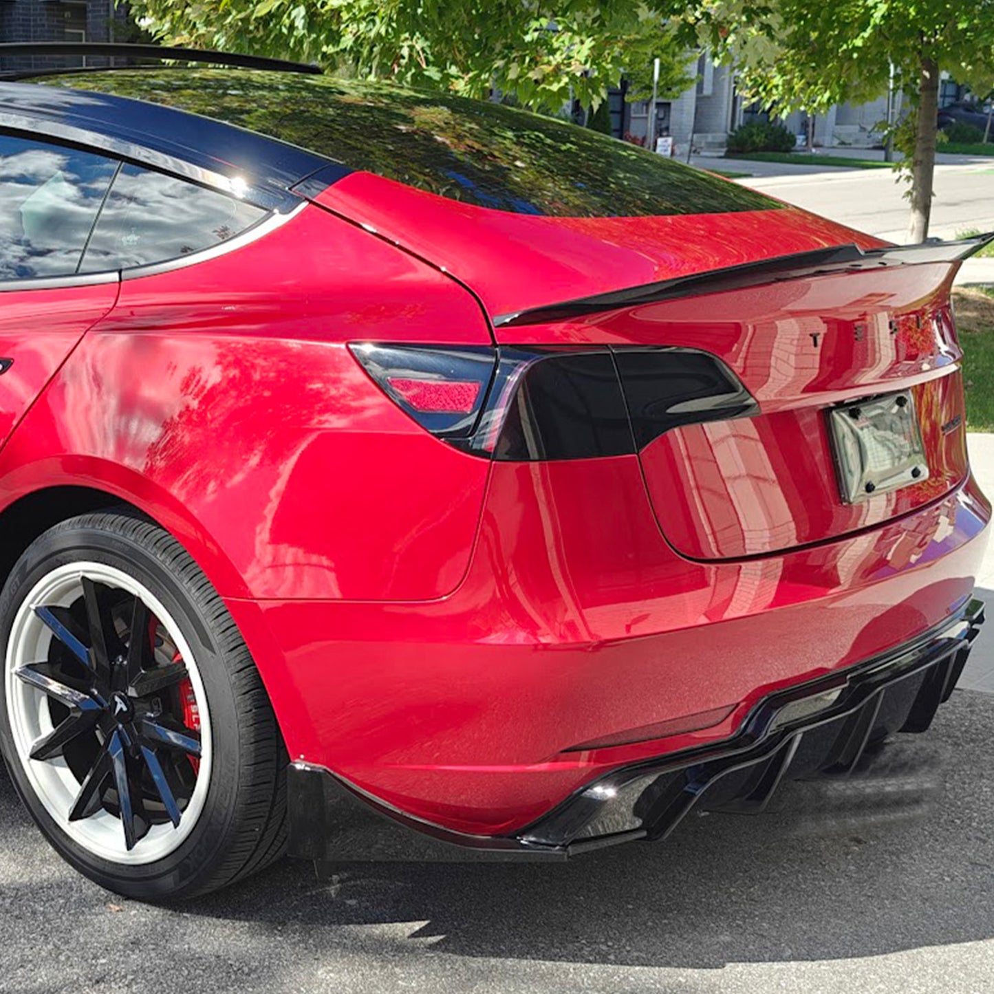 Tesla Model 3 2018-2023 Rear diffuser Style A Gloss Black / Gloss Carbon Fiber Pattern