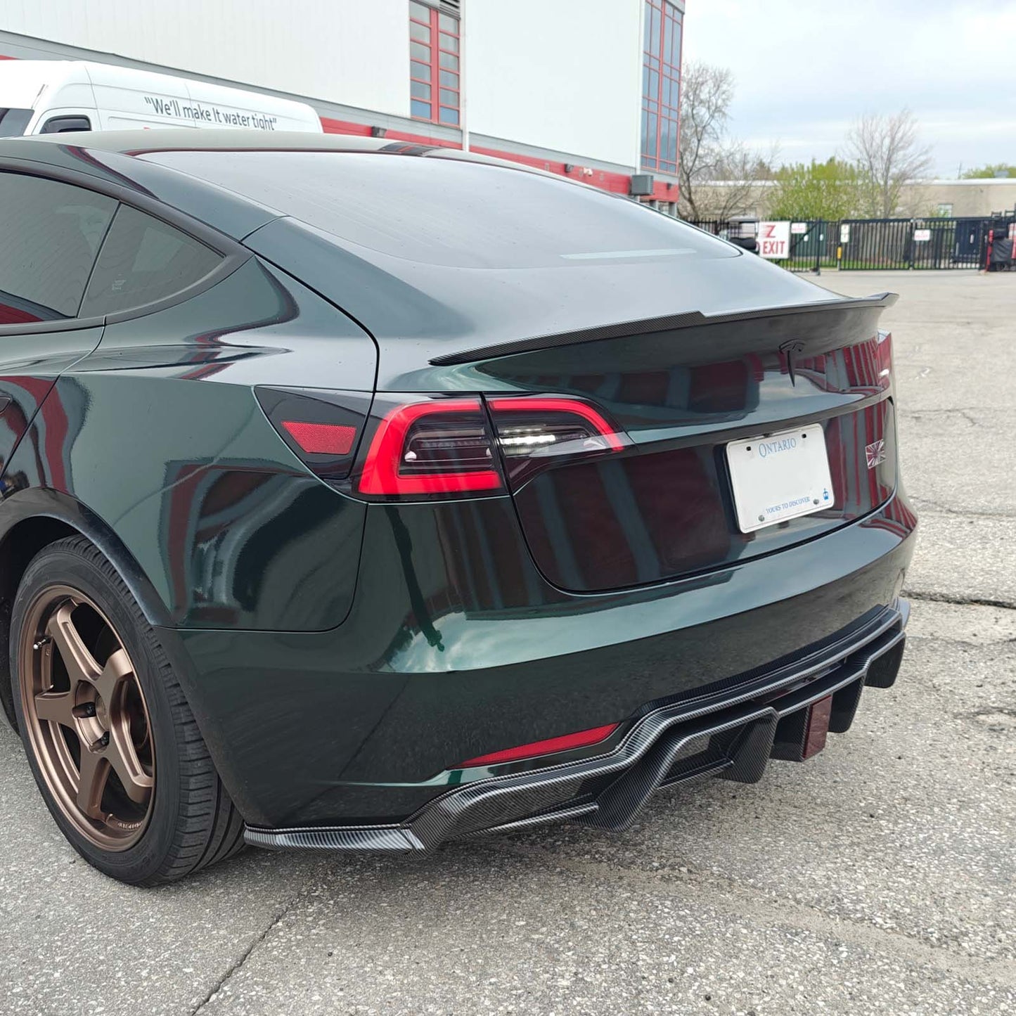 Tesla Model 3 2018-2023 Rear diffuser Style B Gloss Black / Gloss Carbon Fiber Pattern