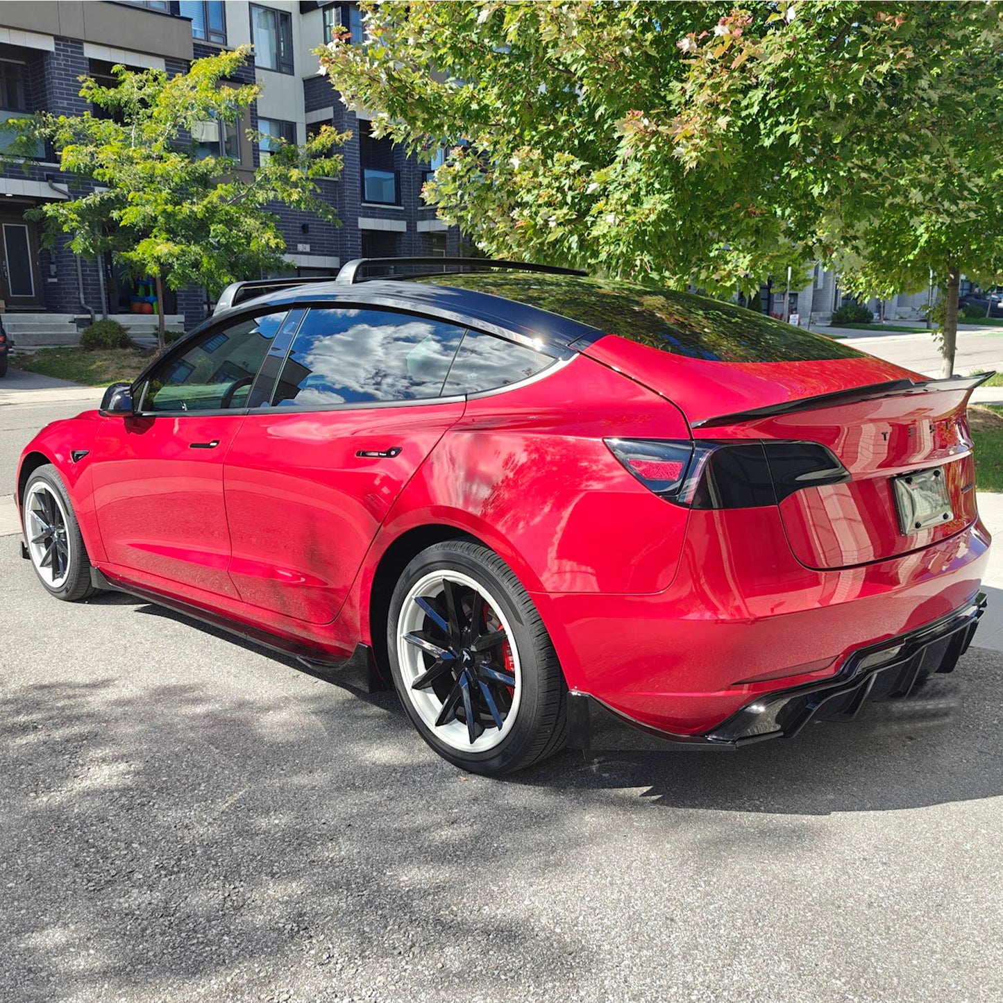 Tesla Model 3 2018-2023 Rear diffuser Style A Gloss Black / Gloss Carbon Fiber Pattern